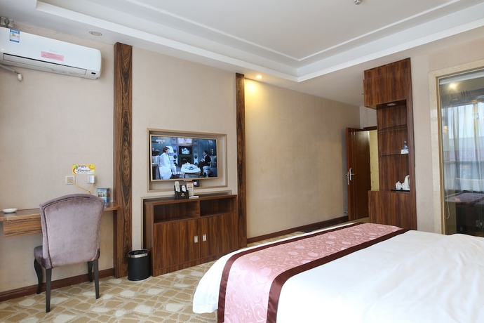 Imagen de la habitación del Hotel Guangzhou Helong. Foto 15