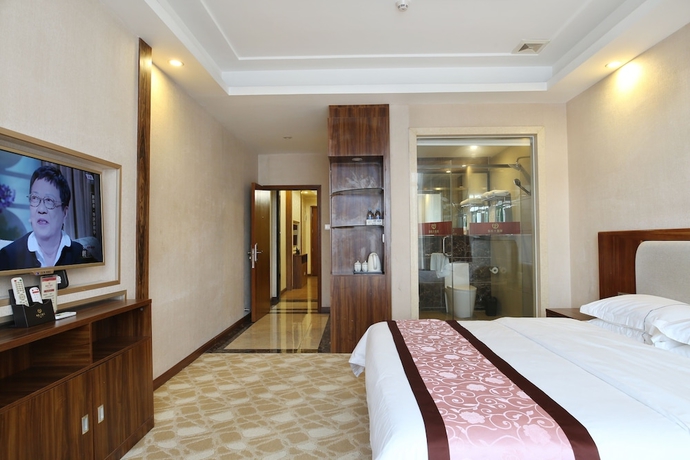 Imagen de la habitación del Hotel Guangzhou Helong. Foto 16
