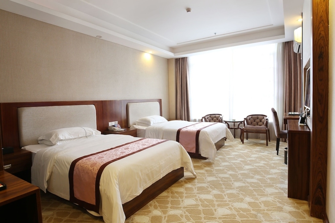 Imagen de la habitación del Hotel Guangzhou Helong. Foto 17