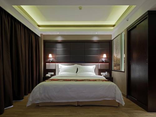 Imagen de la habitación del Hotel Guangzhou Heng He. Foto 1