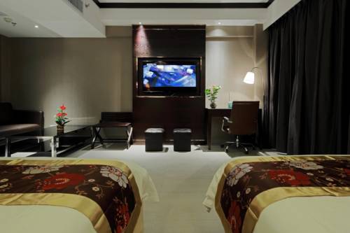Imagen de la habitación del Hotel Guangzhou Heng He. Foto 5