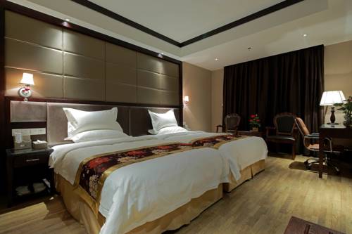 Imagen de la habitación del Hotel Guangzhou Heng He. Foto 6