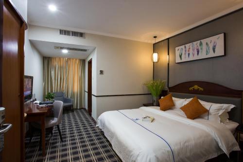 Imagen de la habitación del Hotel Guangzhou Homies. Foto 7