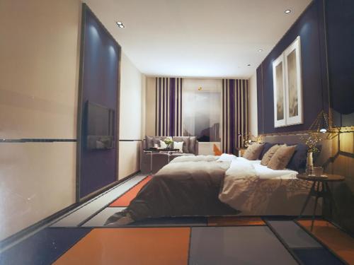 Imagen de la habitación del Hotel Guangzhou Homies. Foto 8