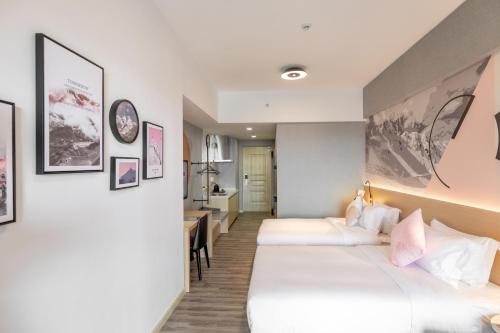 Imagen de la habitación del Hotel Guangzhou Imin. Foto 6