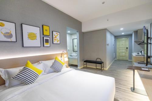 Imagen de la habitación del Hotel Guangzhou Imin. Foto 7