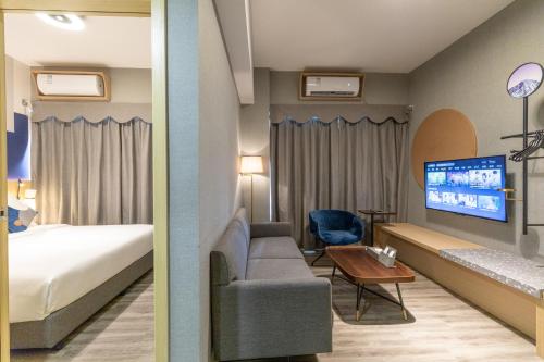 Imagen de la habitación del Hotel Guangzhou Imin. Foto 9