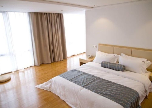Imagen de la habitación del Hotel Guangzhou Impression Business. Foto 9