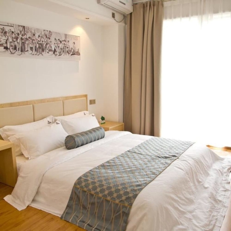Imagen de la habitación del Hotel Guangzhou Impression Business. Foto 11