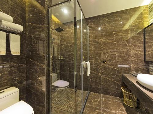 Imagen de la habitación del Hotel Guangzhou Kardon Gorgeous. Foto 5