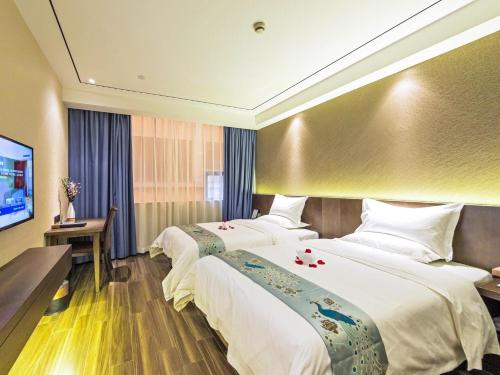 Imagen de la habitación del Hotel Guangzhou Kardon Gorgeous. Foto 7