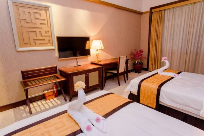 Imagen de la habitación del Hotel Guangzhou Lijiang Mingzhu. Foto 6