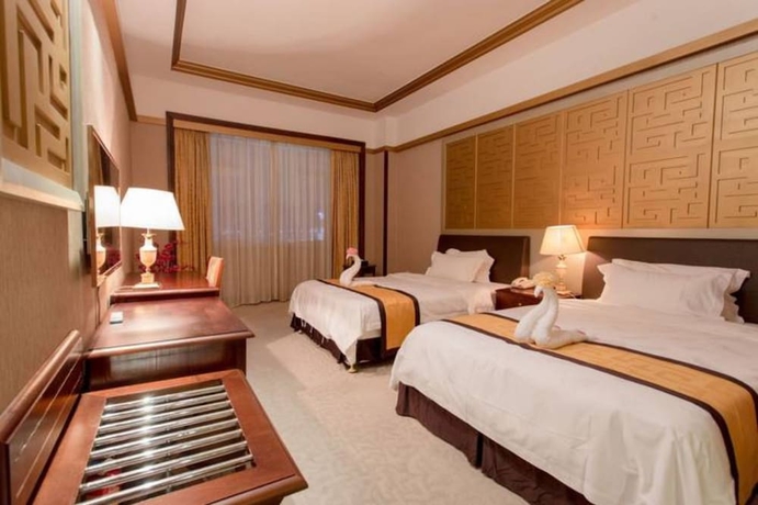 Imagen de la habitación del Hotel Guangzhou Lijiang Mingzhu. Foto 8