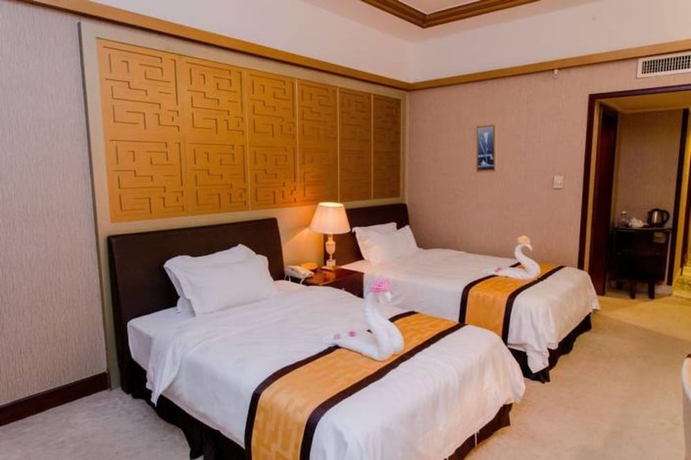 Imagen de la habitación del Hotel Guangzhou Lijiang Mingzhu. Foto 10