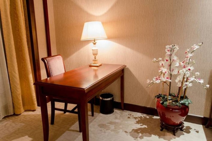 Imagen de la habitación del Hotel Guangzhou Lijiang Mingzhu. Foto 12