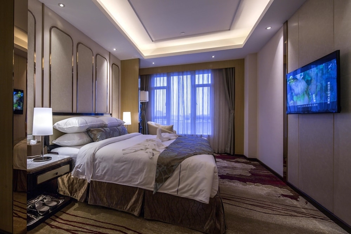 Imagen de la habitación del Hotel Guangzhou Manguo International Hotel. Foto 2