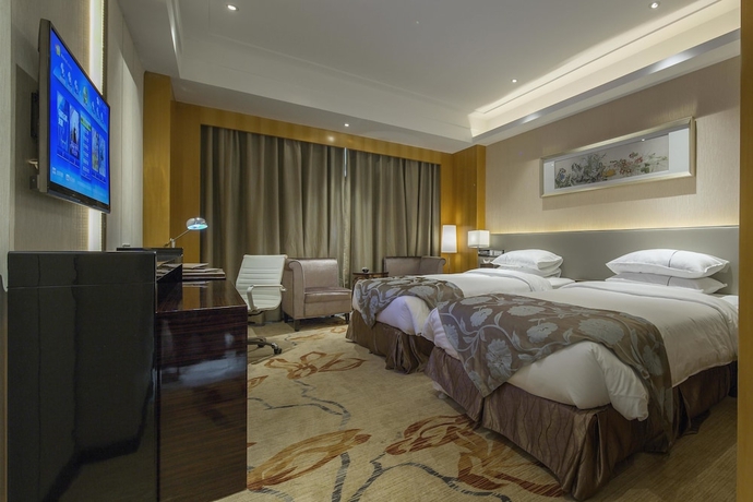 Imagen de la habitación del Hotel Guangzhou Manguo International Hotel. Foto 4