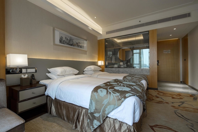 Imagen de la habitación del Hotel Guangzhou Manguo International Hotel. Foto 5