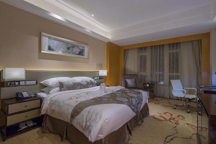 Imagen de la habitación del Hotel Guangzhou Manguo International Hotel. Foto 7