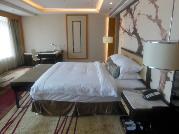 Imagen de la habitación del Hotel Guangzhou Manguo International Hotel. Foto 10
