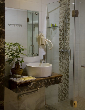 Imagen de la habitación del Hotel Guangzhou Masia. Foto 11