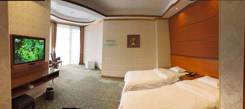 Imagen de la habitación del Hotel Guangzhou Mei Ling. Foto 2