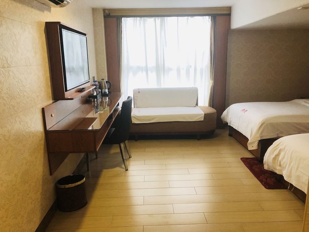 Imagen de la habitación del Hotel Guangzhou Mei Ling. Foto 3
