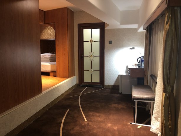 Imagen de la habitación del Hotel Guangzhou Mei Ling. Foto 5