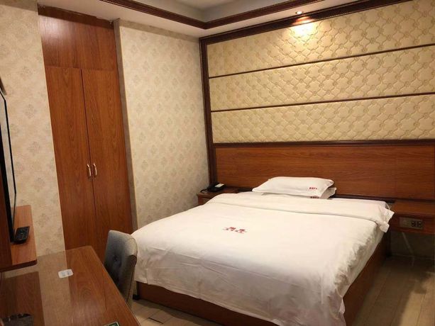Imagen de la habitación del Hotel Guangzhou Mei Ling. Foto 8