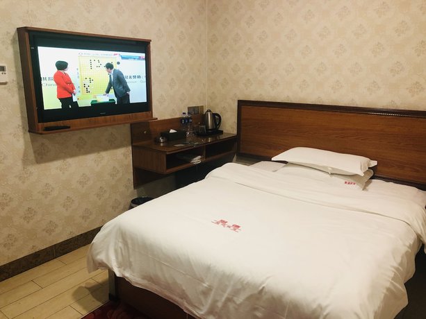 Imagen de la habitación del Hotel Guangzhou Mei Ling. Foto 10
