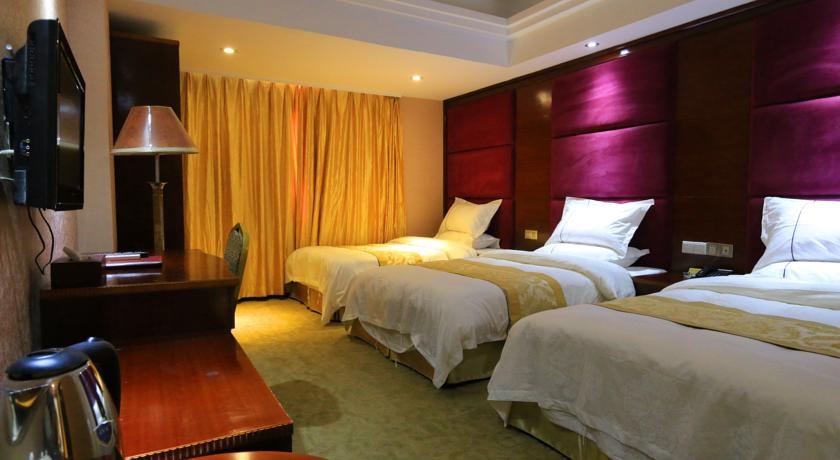 Imagen de la habitación del Hotel Guangzhou Meigang. Foto 4