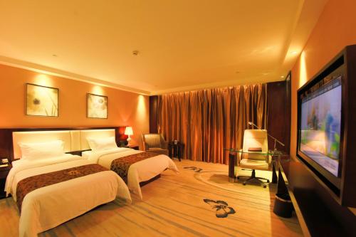 Imagen de la habitación del Hotel Guangzhou Ming Yue. Foto 6