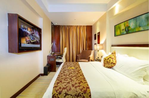 Imagen de la habitación del Hotel Guangzhou Ming Yue. Foto 8