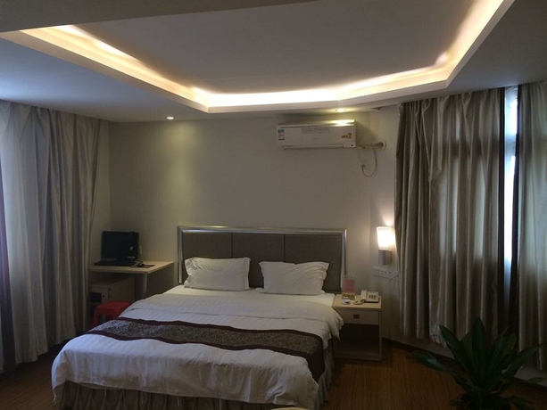 Imagen de la habitación del Hotel Guangzhou Minghong -xiwan. Foto 1