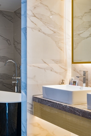 Imagen de la habitación del Hotel Guangzhou Mustin. Foto 3