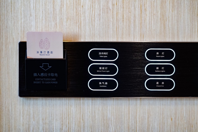 Imagen de la habitación del Hotel Guangzhou Mustin. Foto 5
