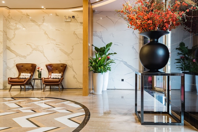 Imagen de los interiores del Hotel Guangzhou Mustin. Foto 14