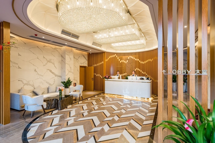 Imagen de los interiores del Hotel Guangzhou Mustin. Foto 15