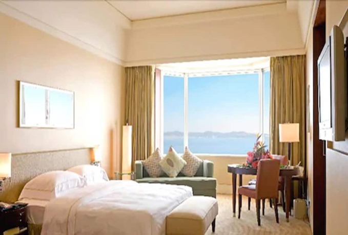 Imagen de la habitación del Hotel Guangzhou Nansha Grand. Foto 7