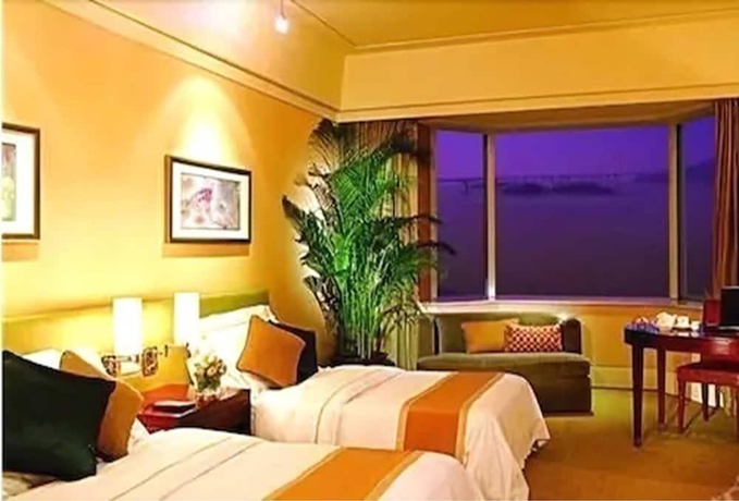 Imagen de la habitación del Hotel Guangzhou Nansha Grand. Foto 8