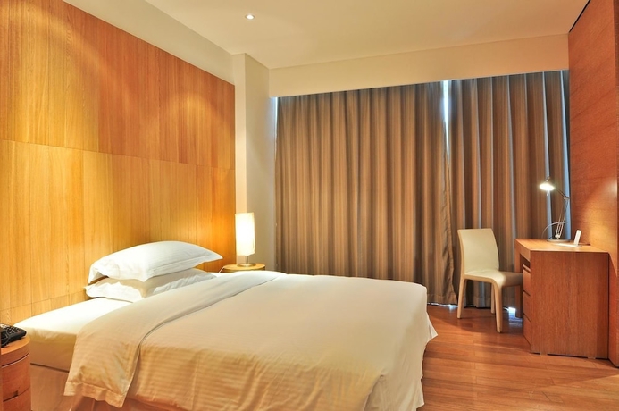 Imagen de la habitación del Hotel Guangzhou Nansha Pearl River Delta World Trade Center Tower. Foto 2