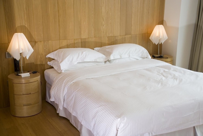 Imagen de la habitación del Hotel Guangzhou Nansha Pearl River Delta World Trade Center Tower. Foto 4