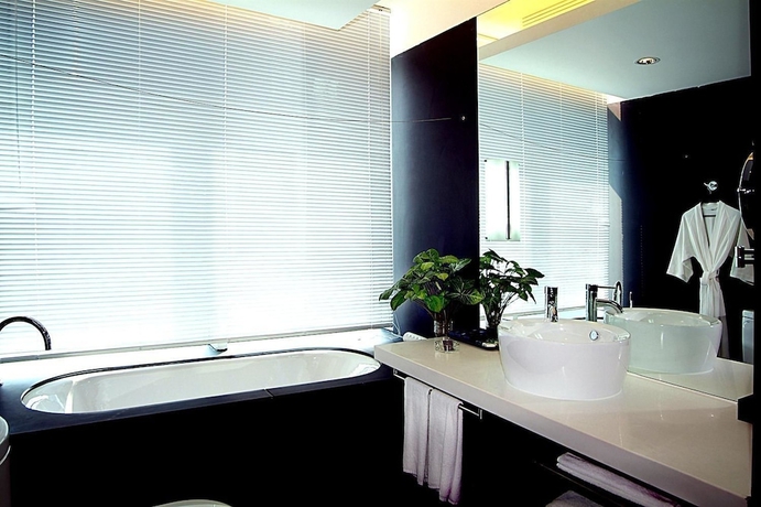 Imagen de la habitación del Hotel Guangzhou Nansha Pearl River Delta World Trade Center Tower. Foto 10