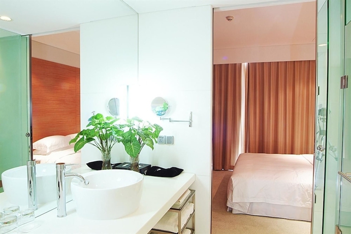 Imagen de la habitación del Hotel Guangzhou Nansha Pearl River Delta World Trade Center Tower. Foto 12