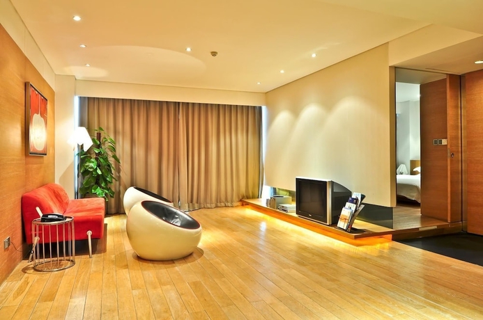 Imagen de la habitación del Hotel Guangzhou Nansha Pearl River Delta World Trade Center Tower. Foto 16