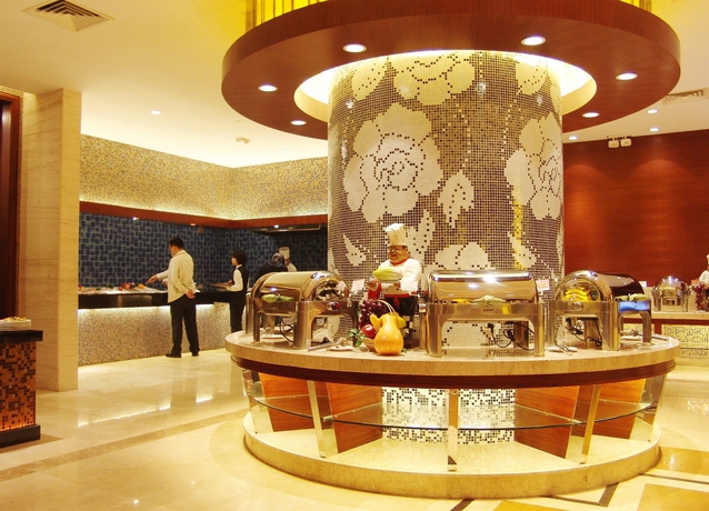 Imagen del bar/restaurante del Hotel Guangzhou New Century. Foto 1
