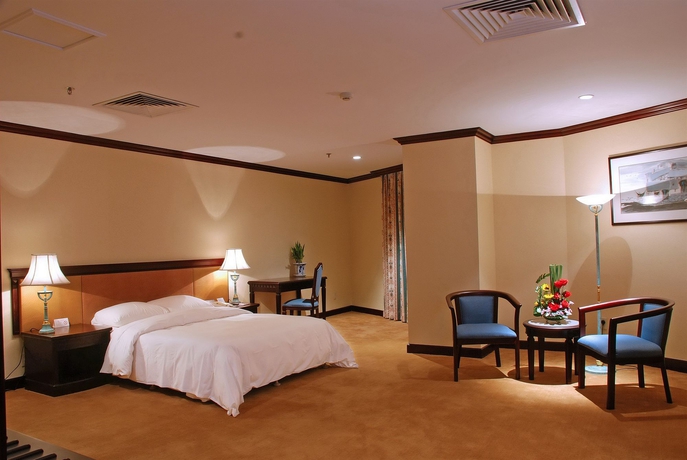 Imagen de la habitación del Hotel Guangzhou New Century. Foto 13