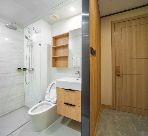 Imagen de la habitación del Hotel Guangzhou Nuomo International. Foto 6