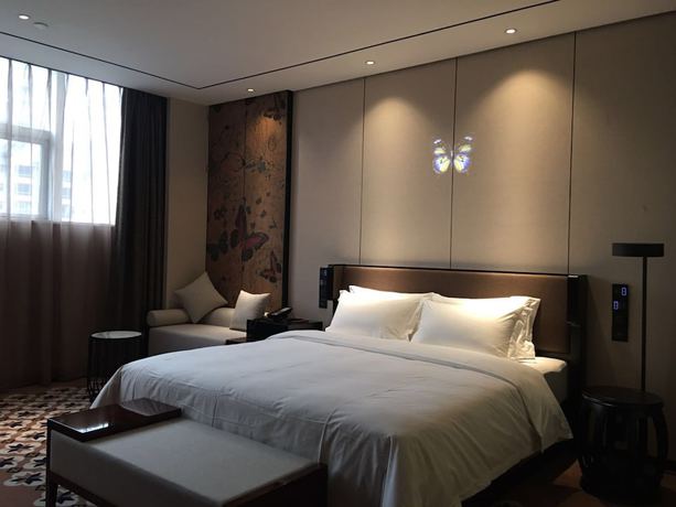 Imagen de la habitación del Hotel Guangzhou Paco - Dongpu Teemall. Foto 3