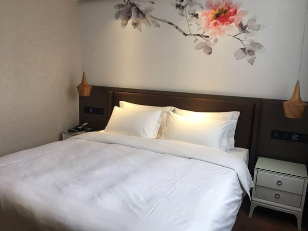 Imagen de la habitación del Hotel Guangzhou Paco - Dongpu Teemall. Foto 4